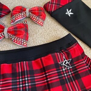 Cheer uniform designed by Rebel! Under piece YL, skirt YXL. Fits like a Y large